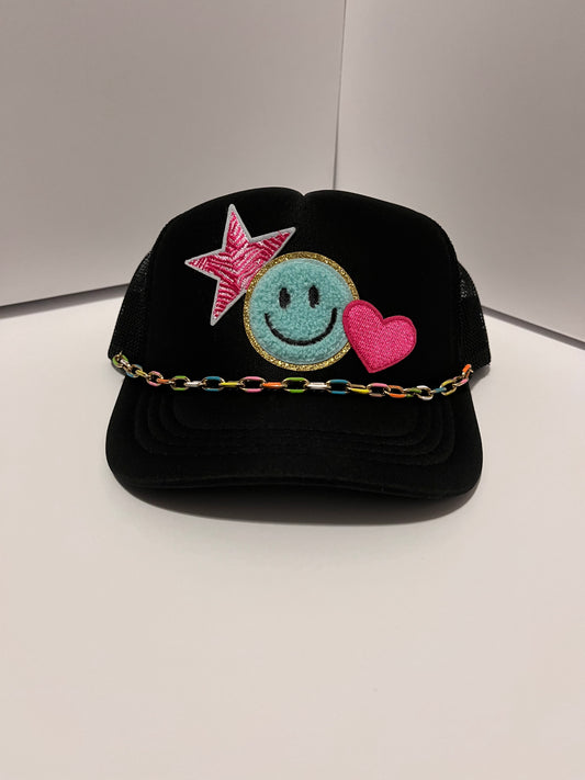 Kids black trucker hat - blue & pink